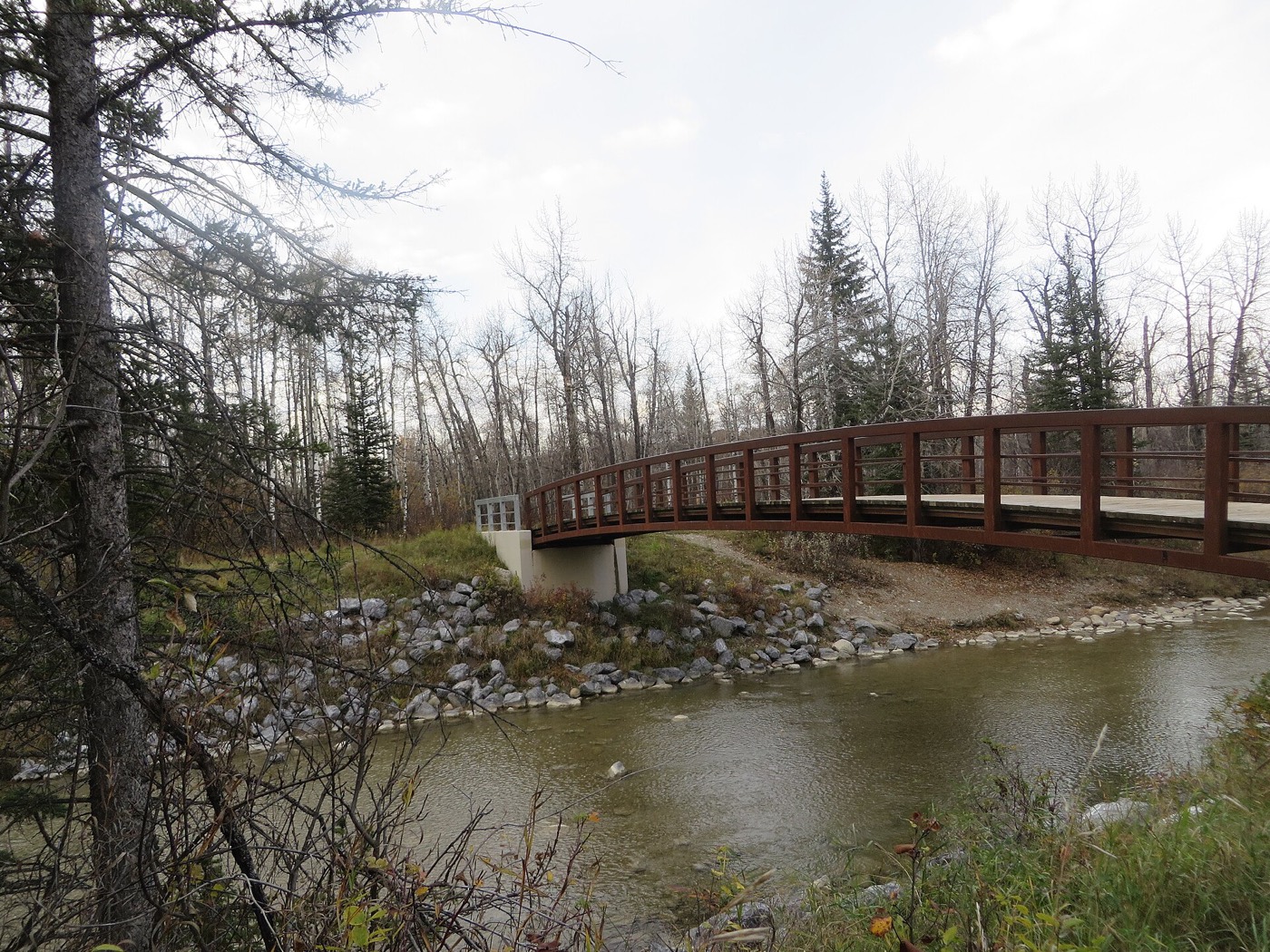 Creek bridge in autumn — Fish Creek, Calgary area